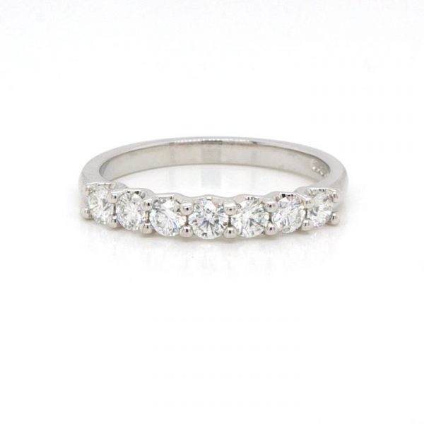 Diamond Seven Stone Half Eternity Ring; platinum half eternity ring set with seven brilliant cut diamonds, 0.50 carat total, all claw set adjacently
