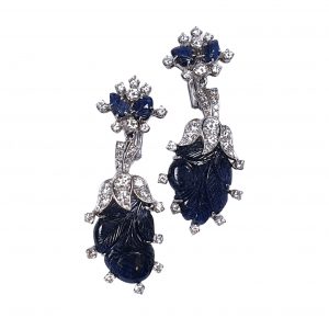 Vintage Carved Sapphire Diamond Platinum Drop Earrings; featuring over 20 carats of wonderfully carved sapphires accented with brilliant-cut diamonds, Circa 1940s