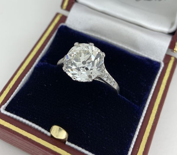 Antique Old Mine Cushion Cut Diamond Solitaire Engagement Ring; central 4.82 carat old mine cushion-cut diamond with diamond set shoulders, mounted in platinum