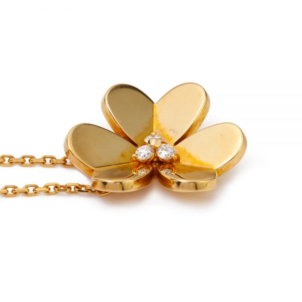 Van Cleef and Arpels Diamond and 18ct Yellow Gold Flower Necklace; featuring a flower shaped pendant set with 0.15cts diamonds, in original Van Cleef & Arpels necklace pouch