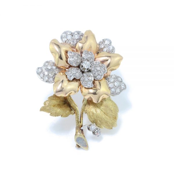 Art Deco Old Cut Diamond Floral Brooch; 2.10 carat total, in 18ct yellow gold with textured stem and leaves. Possibly Italian, Circa 1920