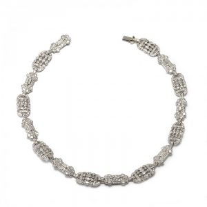 Belle Epoque Diamond Necklace Bracelets in Platinum; two early 20th century French bracelets with alternating decorative diamond-set panels, 2.00 carats of round-cut, single-cut, baguette-cut and marquise-cut diamonds. The two bracelets can be connected together to be worn as a choker necklace