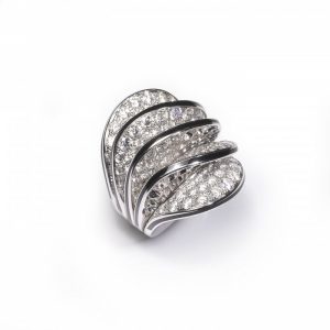 Cartier Paris Nouvelle Vague Diamond and Enamel Cocktail Ring; pavé set with 5.00 carats of round brilliant-cut diamonds in five wave-shaped formations, the edges with black enamel accents, in 18ct white gold, Signed