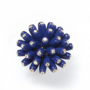 Cartier Lapis Lazuli and Diamond Paris Nouvelle Vague Bombe Ring; polished torpedo-shaped pieces of lapis lazuli with round diamonds rub-over set into the ends, in 18ct yellow gold. Signed and Numbered, Circa 2010