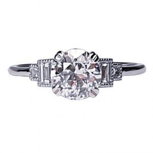 Vintage 1.06ct Old Cut Diamond and Platinum Engagement Ring; featuring a 1.06 carat G colour VS1 clarity old European transitional cut diamond with baguette and radiant-cut diamond shoulders, in platinum