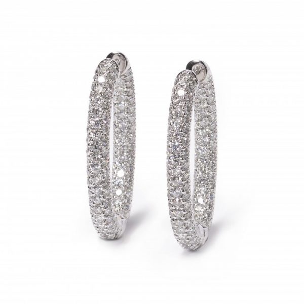 Diamond Oval Hoop Earrings; pavé set with two hundred and sixteen round brilliant-cut diamonds, 7.60 carat total, in 18ct white gold