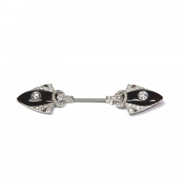 Antique Edwardian Onyx and Diamond Jabot Pin Brooch; Belle Epoque jabot pin comprised of two shield-shaped sections set with polished black onyx and 2.50 carats transitional-cut diamonds, mounted in platinum