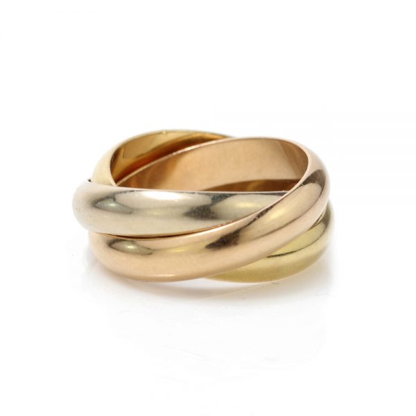 Cartier 18ct Gold Trinity Ring; comprised of three interlocking gold bands, Made in 1997, Signed