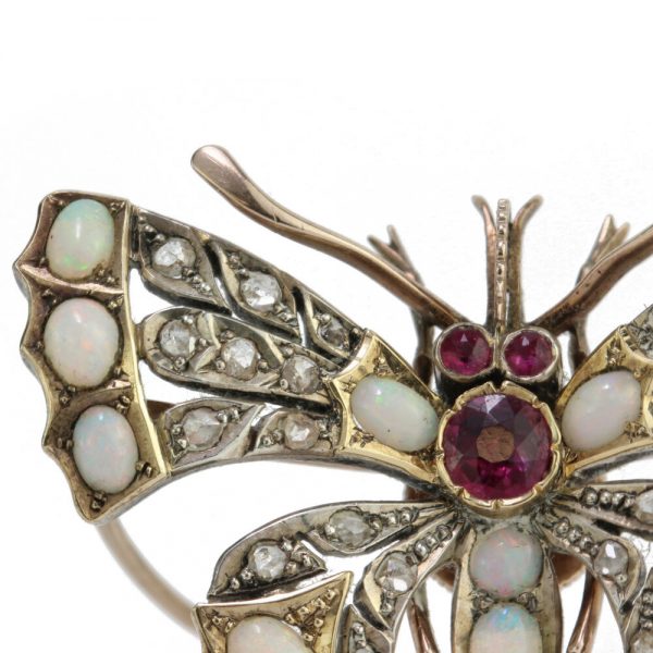 Antique Victorian Butterfly Brooch with Opals, Rubies and Diamonds, set in silver and 15ct gold, 19th century, Circa 1860s