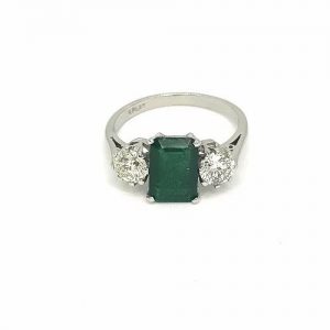Emerald Cut Emerald and Diamond Three Stone Ring in 18ct White Gold, 1.27 carats
