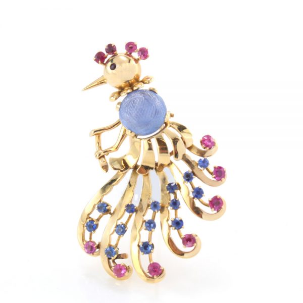 Vintage 2.50ct Carved Sapphire and 18ct Gold Peacock Brooch; with a carved sapphire centre, blue sapphires and rubies, Circa 1970s