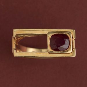 Vintage Geometric Ruby and 18ct Yellow Gold Articulated Slider Ring; cushion mixed-cut natural red ruby in gold rectangular setting slides.  France, Circa 1980-1990