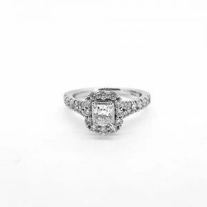 Emerald Cut Diamond Cluster Ring; featuring a central 0.85 carat emerald-cut diamond with diamond surround and diamond-set shoulders, in 18ct white gold
