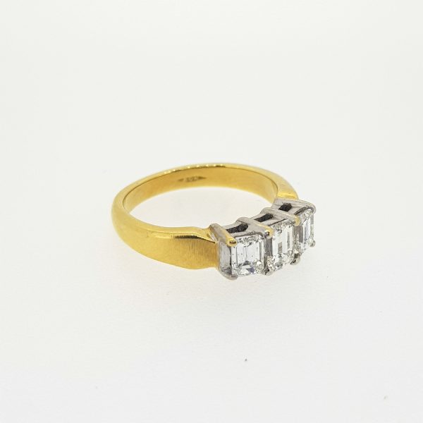 Emerald Cut Diamond Three Stone Ring; diamond trilogy ring set with three emerald-cut diamonds, 1.00 carat total, in 18ct yellow gold