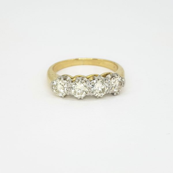 Modern Four Stone Diamond Ring, 1.25 carat total, claw set, 18ct yellow gold