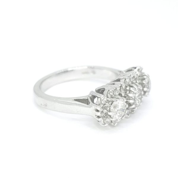 Triple Cluster Diamond Ring; featuring three brilliant-cut diamonds, claw-set within a diamond surround, 1.60 carat total, in 18ct white gold