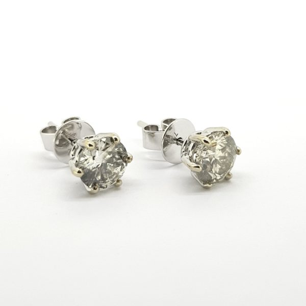 Diamond Stud Earrings; featuring 2.11 carats of round brilliant-cut diamonds, six-claw set in 18ct white gold, with post and butterfly fittings