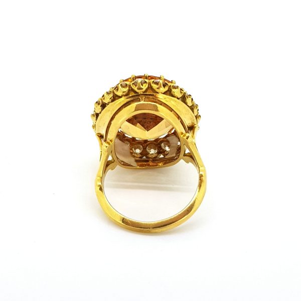 Vintage Oval Cut Imperial Topaz and Diamond Cluster Ring in Yellow Gold
