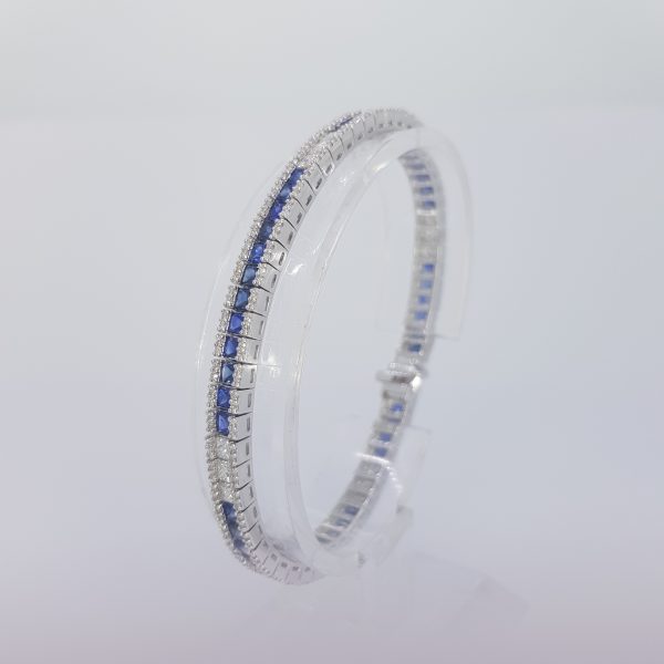 Princess Cut Sapphire and Diamond Line Bracelet in 18ct white gold. Sapphires 7.03 carats. Diamonds 2.21 carats