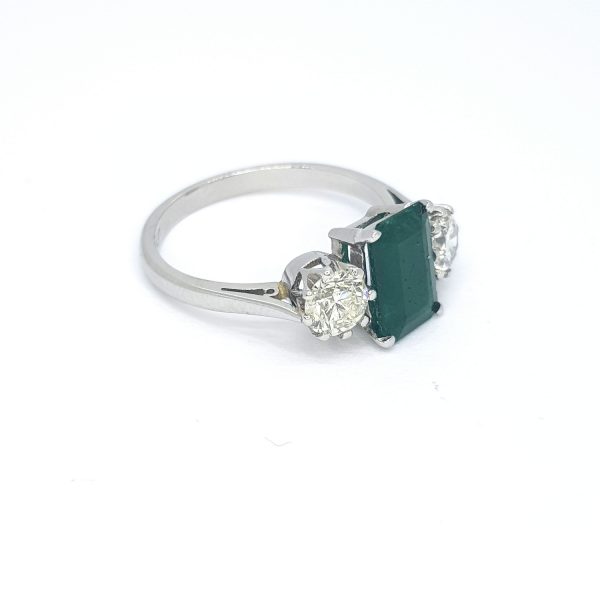 Emerald Cut Emerald and Diamond Trilogy Ring in 18ct White Gold, 1.27 carats