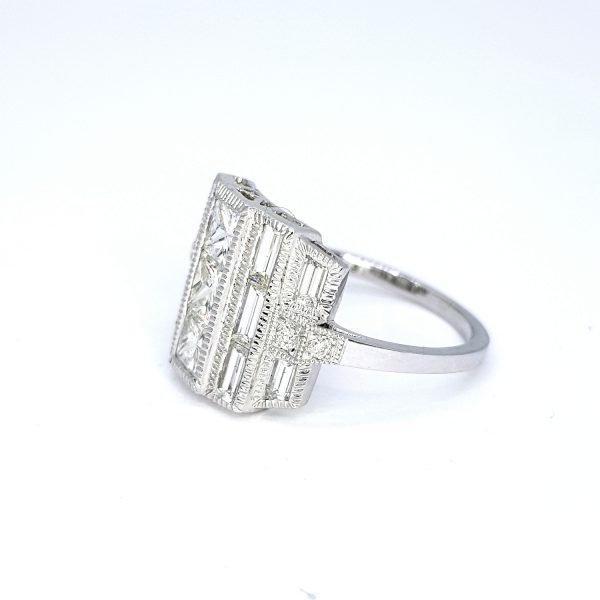 Diamond Dress Ring in 18ct White Gold, 2.63 carat total, three princess-cut diamonds flanked by baguette cut diamonds, brilliant-cut diamond set shoulders