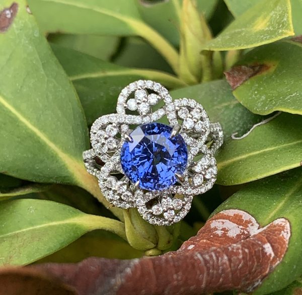 Cornflower blue Sapphire and diamond flower ring