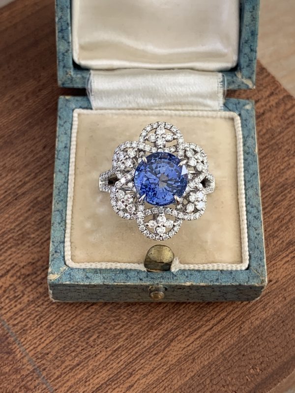 in box Cornflower blue Sapphire and diamond flower ring