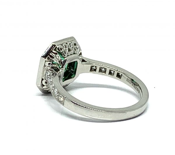 Deco style emerald and diamond engagement ring square target platinum