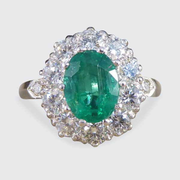 Oval 1.37ct Emerald and 1.00ct Diamond Cluster Ring