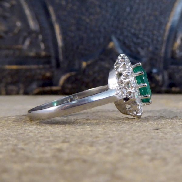 Oval 1.37ct Emerald and 1.00ct Diamond Cluster Ring