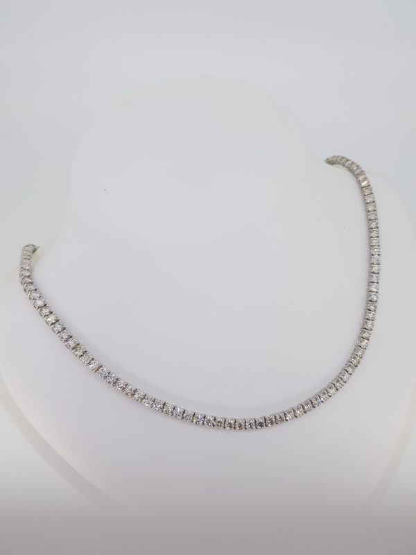 Fine Diamond Line Necklace; 17.90 carats of round brilliant cut diamonds, each four-claw set and mounted in 18ct white gold, 33cm in length
