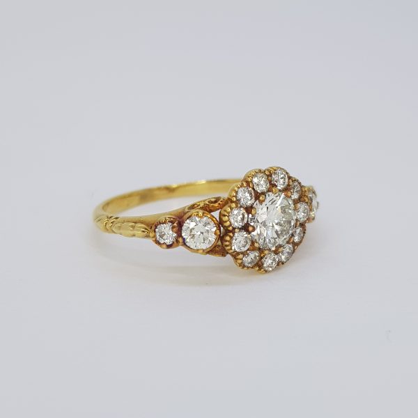 Georgian Style Diamond Floral Cluster Ring in 18ct Yellow Gold, 0.75 carat total, central claw set brilliant cut diamond surrounded by diamonds, hand defined edges giving a scalloped edge finish