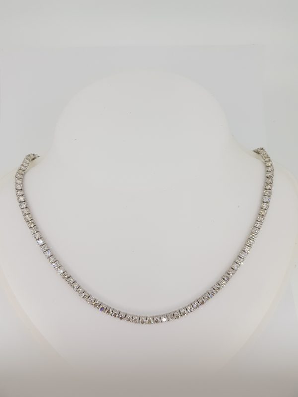 Fine Diamond Line Necklace; 17.90 carats of round brilliant cut diamonds, each four-claw set and mounted in 18ct white gold, 33cm in length