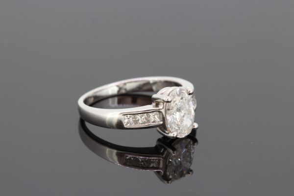 1.22ct Oval Cut Diamond Engagement Ring with Diamond Shoulders in 18ct White Gold