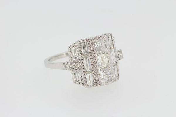 Art Deco Style Diamond Dress Ring in 18ct White Gold; set with princess-cut, baguette-cut and brilliant-cut diamonds
