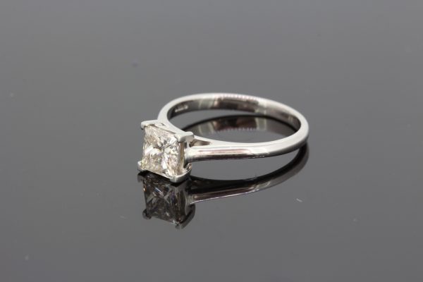 Princess Cut Diamond Solitaire Engagement Ring in Platinum; single stone diamond ring claw set with a 1.01 carat square-cut diamond
