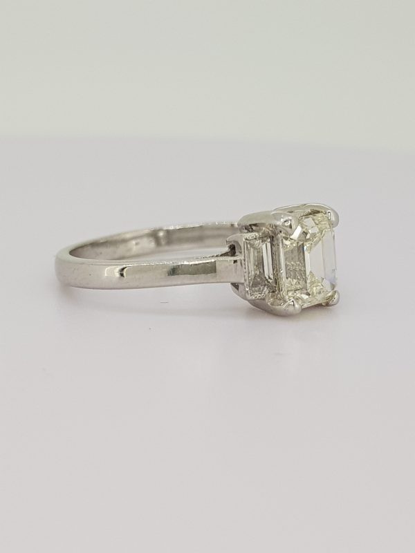 Emerald Cut Diamond Ring with Baguette Diamond Shoulders; 1.03 carat emerald-cut diamond, flanked by 0.24cts baguette cut diamonds, in 18ct white gold