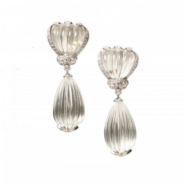 Vintage Fluted Rock Crystal and 4.5ct Diamond Drop Earrings; fan-shaped fluted rock crystal sections with a row of brilliant-cut diamonds suspending fluted rock crystal pendant drops capped with a diamond-set six-pointed star via diamond-set clusters, in 18ct white gold. American, Circa 1980