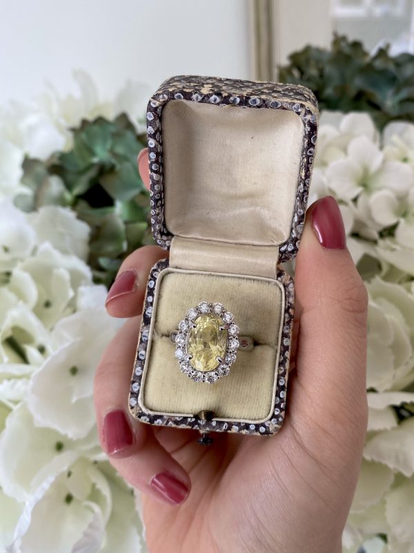6.42ct Yellow Sapphire and Diamond Oval Cluster Ring