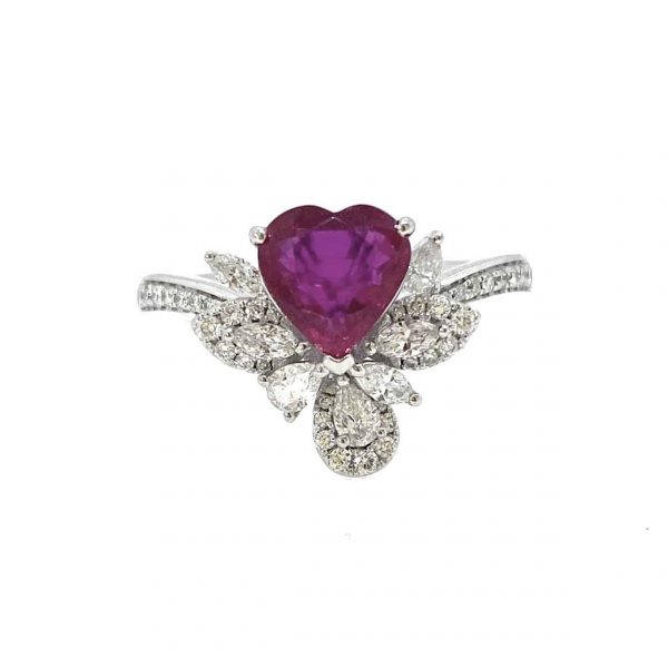 Heart Shaped Burma Ruby and Diamond Cluster Dress Ring; 1.35 carat heart-shaped Burmese ruby with no heat treatment, with diamond leaf and petal clusters and diamond set shoulders, in platinum