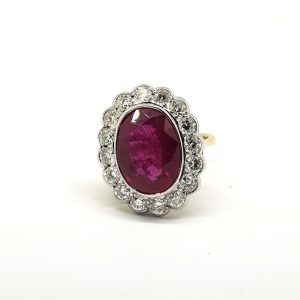 7.03ct Ruby and Diamond Oval Floral Cluster Ring in 18ct Gold