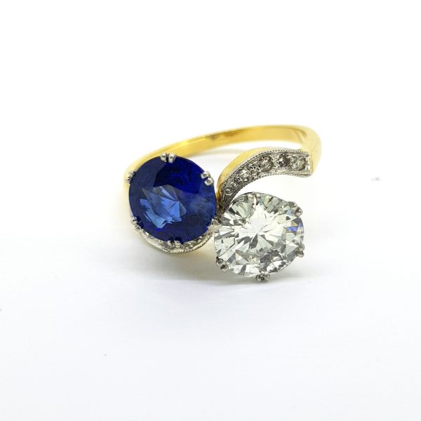 Sapphire and Diamond Toi et Moi Crossover Ring. Sapphire 2.10 carats, Diamond 1.54 carats