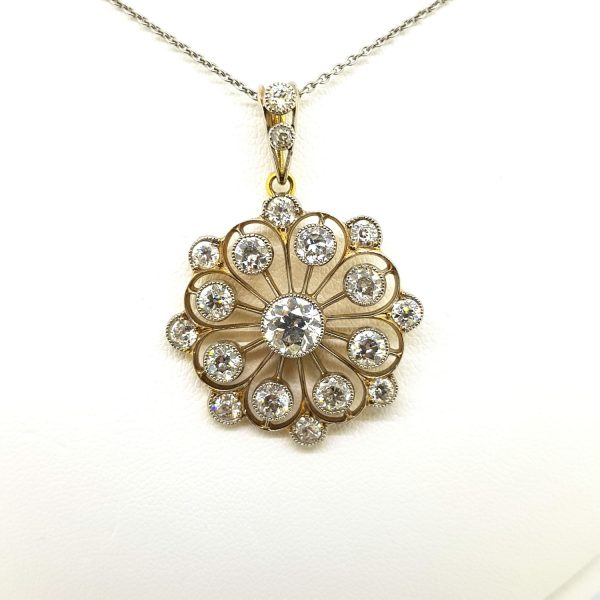 Antique Diamond Flower Cluster Pendant; 4 carats of beautiful bright diamonds set in platinum on yellow gold, with folding bale, on a platinum 16" chain