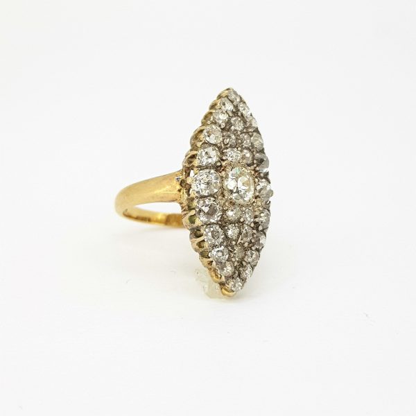 Antique Edwardian Old Cut Diamond Marquise Shaped Cluster Navette Ring; set with 2.00 carats of old-cut diamonds, in 18ct yellow and white gold
