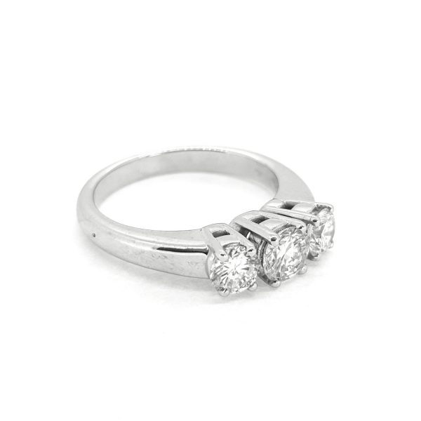 Three Stone Diamond Ring; claw set with three round brilliant-cut diamonds, 1.00 carat total, in 18ct white gold