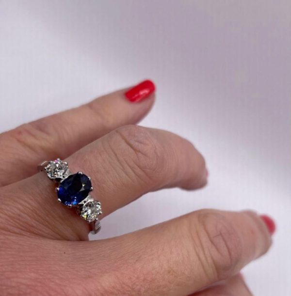 1.00ct Oval Cut Sapphire and Diamond Three Stone Ring in Platinum