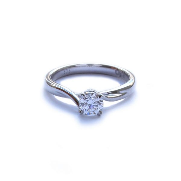 Diamond and Platinum Twist Engagement Ring, set with a certified 0.50 carat E colour VS2 clarity round brilliant-cut diamond, with nine diamond set under the mount
