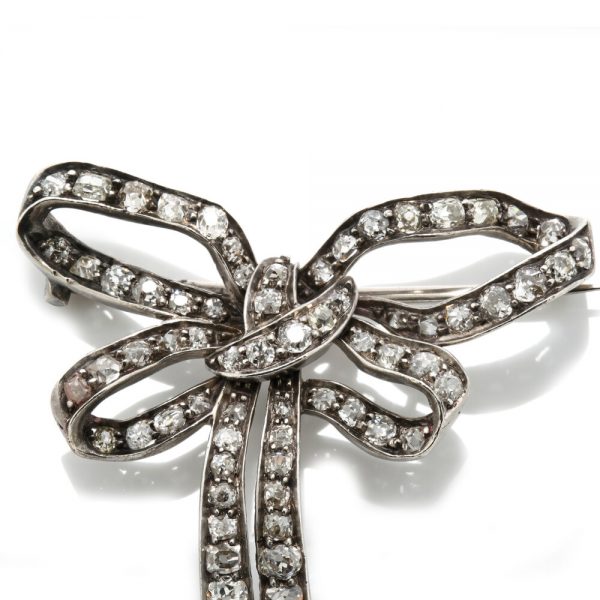 Antique Victorian Old Cut Diamond and Platinum Bow Brooch, 1.44 carat total, Circa 1890s