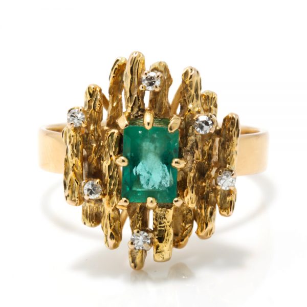 Contemporary Emerald and Diamond Cluster Ring; modernist 14ct yellow gold ring set with a central 1ct emerald decorated with diamonds, Signed KEVIN, Circa 1990s