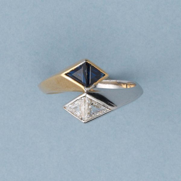 Illario Diamond and Sapphire Toi et Moi Ring; 18ct bi-colour gold set with two triangle shaped sapphires and two triangle shaped diamonds. Master mark Illario, famed for designing for Bvlgari in the 1950s-1970s - Italy
